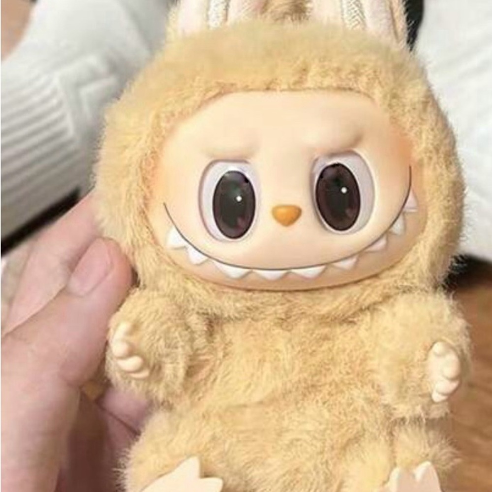 Adorable Tan Plush Toy with Big Eyes